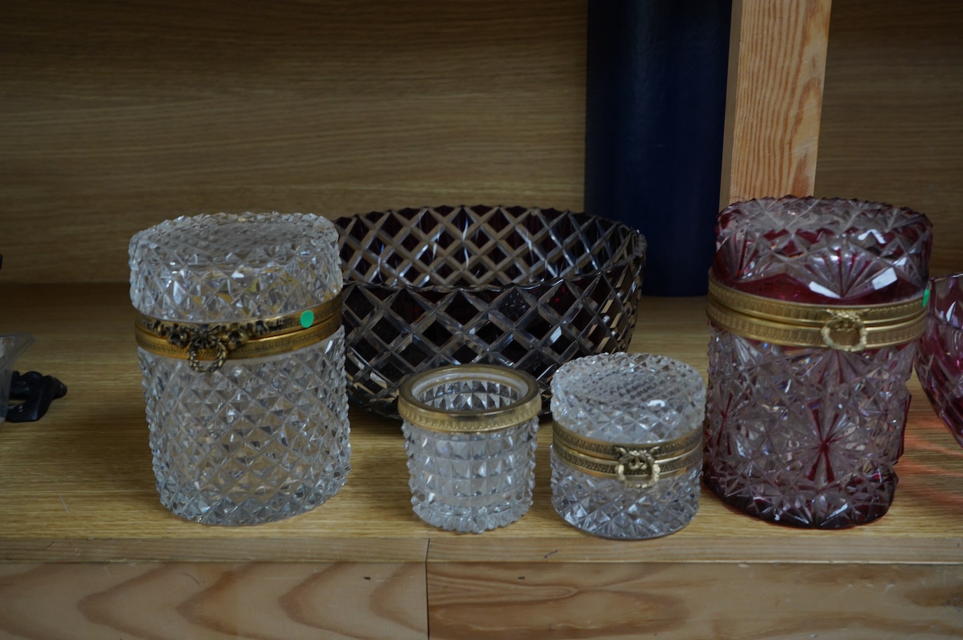 Three Bohemian ruby overlaid glass bowls and two jars, largest bowl 23cm diameter. Condition - some very minor nicks and light surface scratches, otherwise good